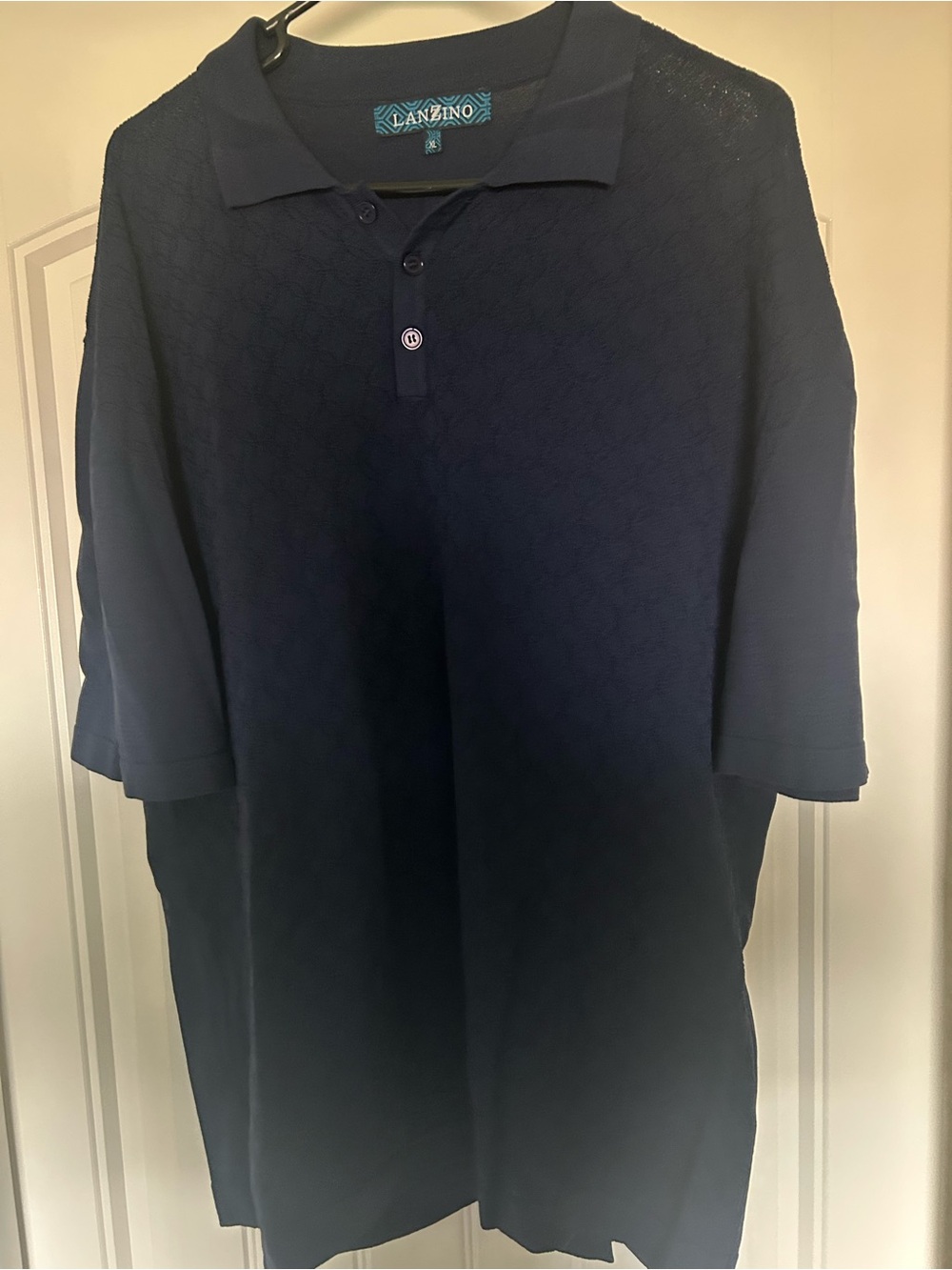Men's Dark Blue Polo Shirt with Subtle Pattern